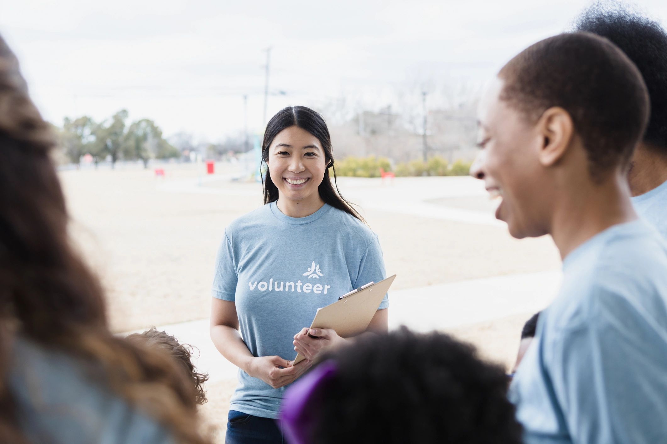 Young adult team leader smiling